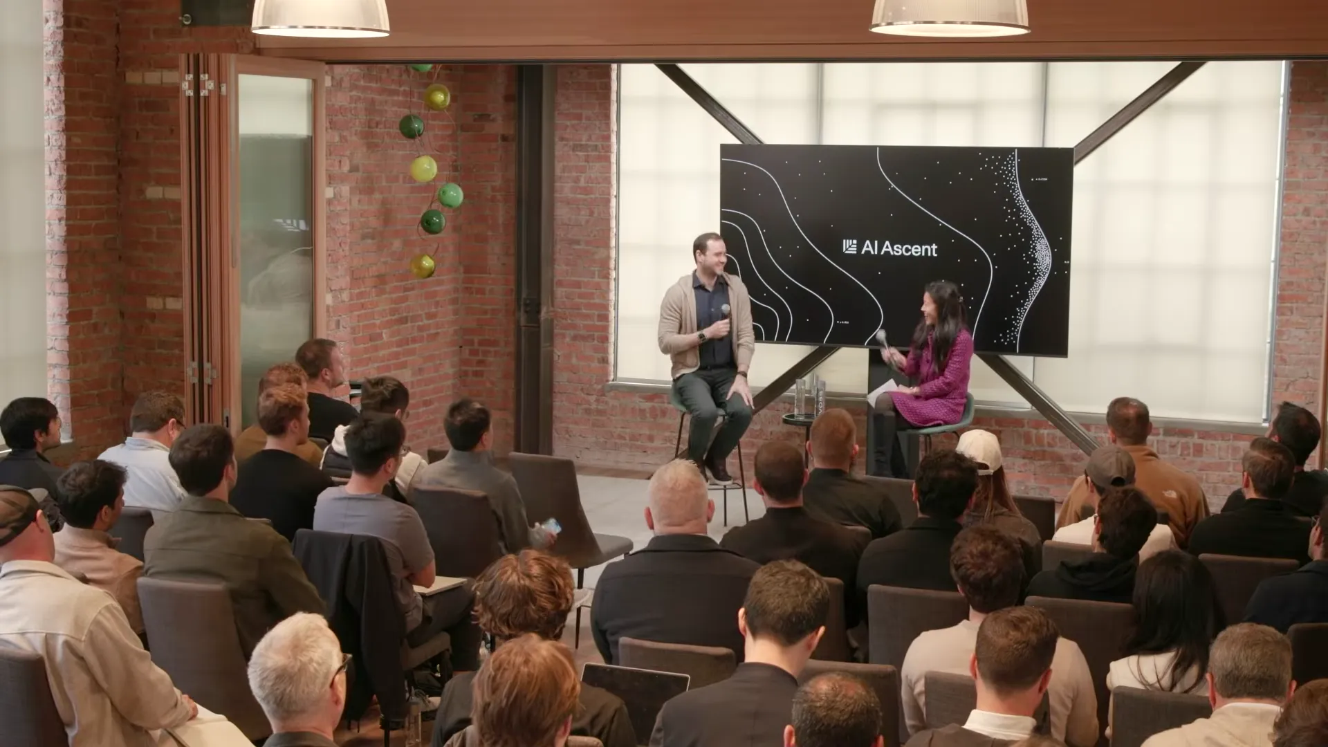 Andrej Karpathy on stage at Sequoia AI Ascent 2026 discussing why he feels behind as a programmer in 2026